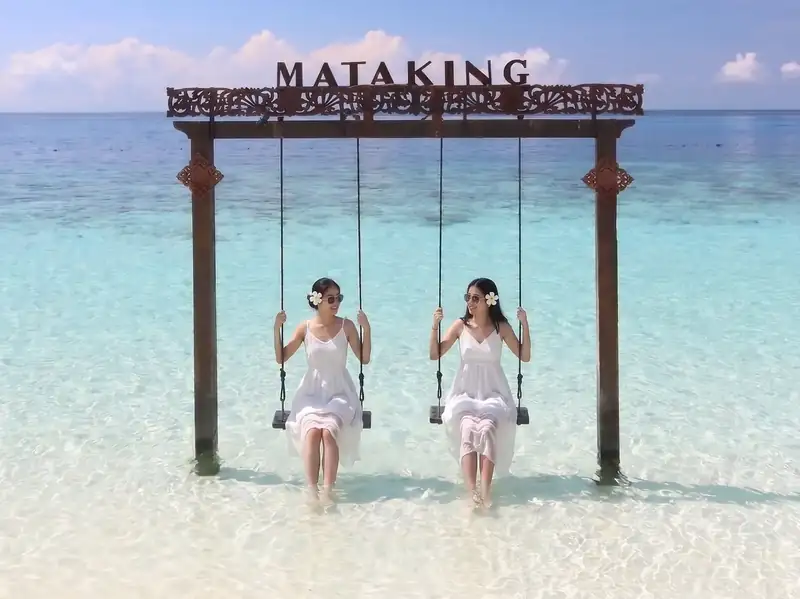 Enjoying the scenery of Mataking Island with Noura Resort near the Tun Sakaran Marine Park.